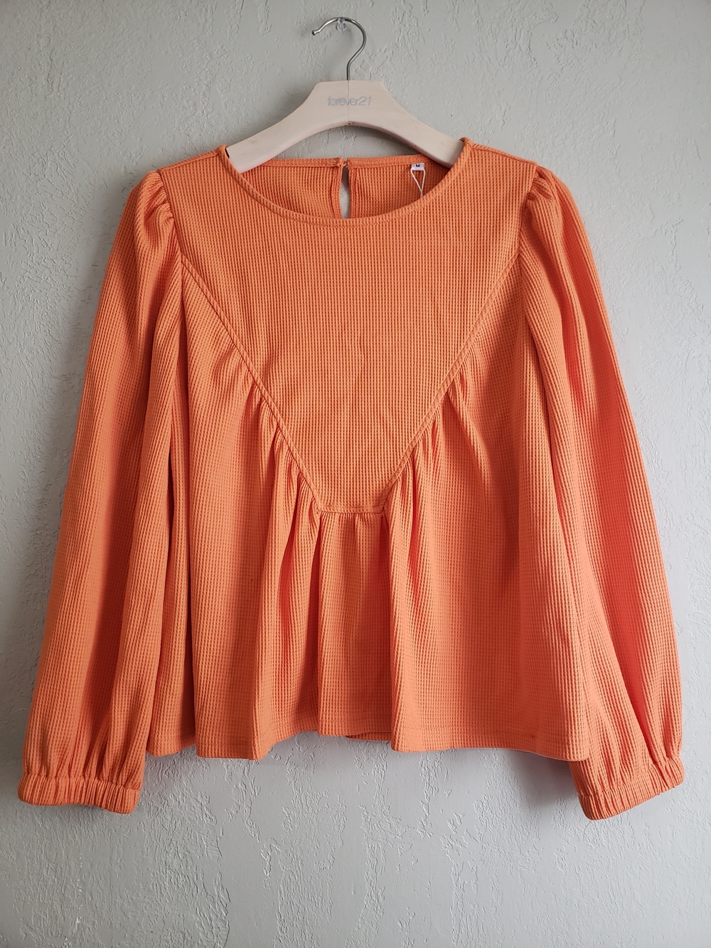 Coral Orange Textured Peplum Long-Sleeve Blouse